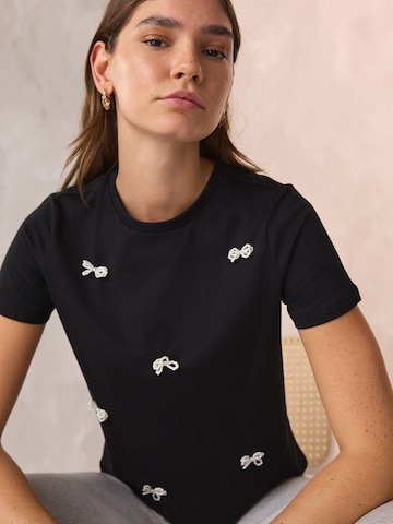 Next T-shirt i svart