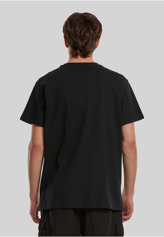 Mister Tee Shirt 'Christmas Tree Pickup' in Zwart