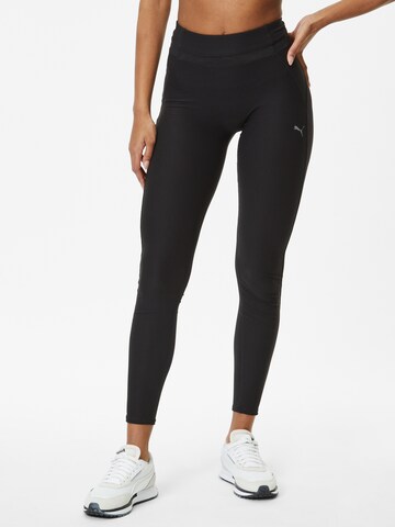 PUMA Skinny Workout Pants in Black: front