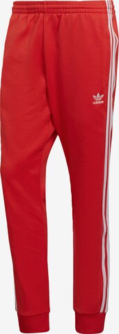 ADIDAS ORIGINALS Tapered Broek 'Adicolor Classics Primeblue Sst' in Rood: voorkant