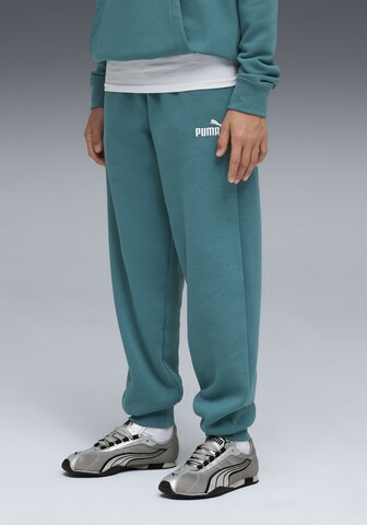 PUMA Tapered Sportbroek in Groen