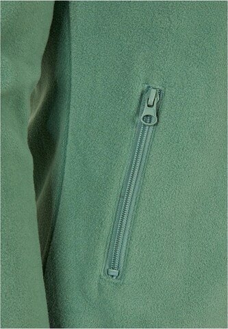 Veste en polaire Urban Classics en vert