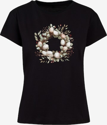 T-shirt 'Osterkranz Eierkranz Blumenring' F4NT4STIC en noir : devant