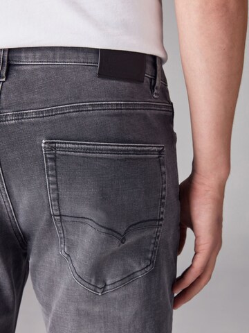 Slimfit Jeans di Next in grigio