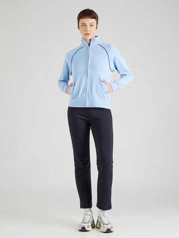 mėlyna Champion Authentic Athletic Apparel Treniruočių kostiumas: priekis