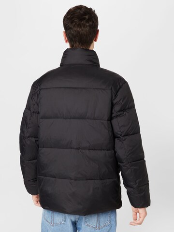 Tommy Jeans Winterjas in Zwart