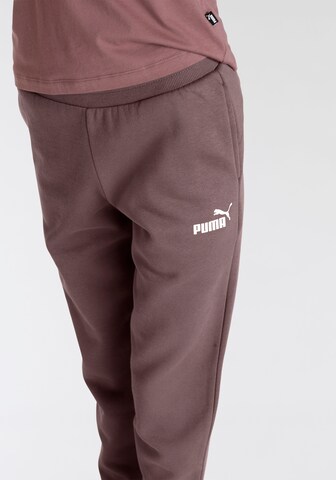 PUMA Конический (Tapered) Спортивные штаны 'Essentials' в Лиловый