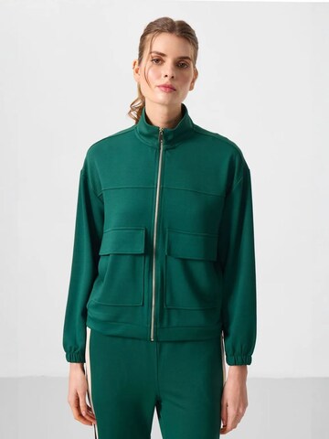 Tommy Life Sweatvest in Groen: voorkant