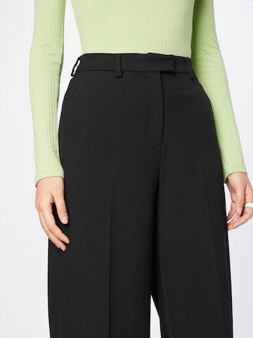 UNITED COLORS OF BENETTON Szeroka nogawka Spodnie w kant w kolorze czarny