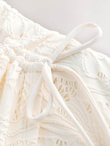 Next Shaping-badpak in Beige