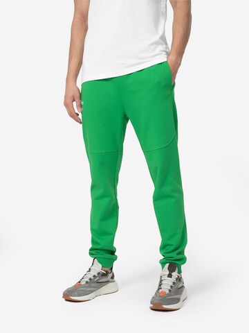 Effilé Pantalon de sport 4F en vert : devant