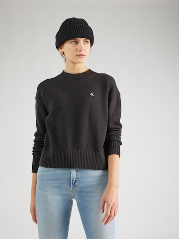 Pull-over Calvin Klein Jeans en noir : devant