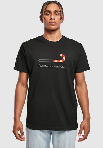 Merchcode Shirt 'Christmas Loading' in Zwart: voorkant