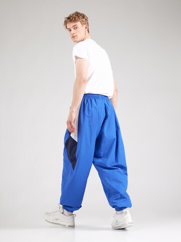 Nike Sportswear Tapered Nadrág 'CLUB' - kék