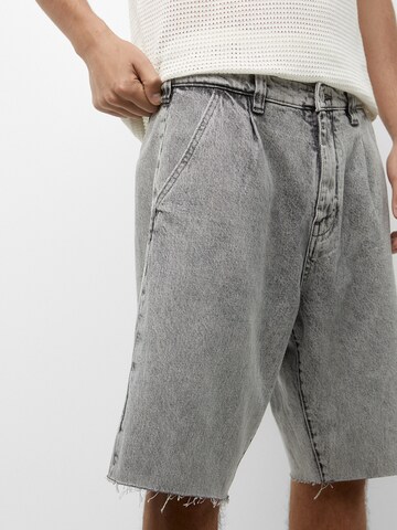 Pull&Bear Wide Leg Jeans med lægfolder i grå