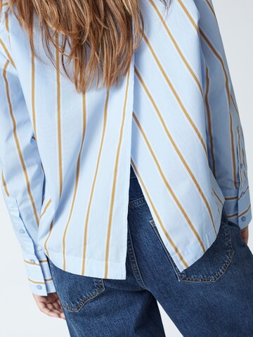 Chemisier 'Amora' co'couture en bleu