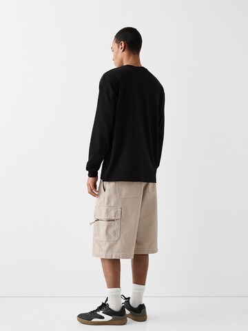 Bershka Loose fit Cargo Pants in Beige