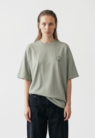Maglietta 'PRODUCT OF BERLIN' di Vertere Berlin in verde: frontale