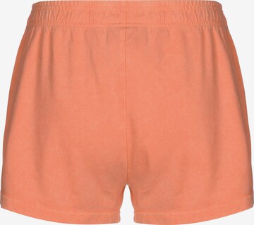 Nike Sportswear Loose fit Pants in Orange