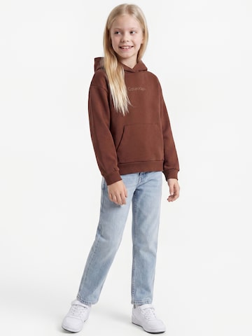 Calvin Klein JeansSweater majica - smeđa boja: prednji dio