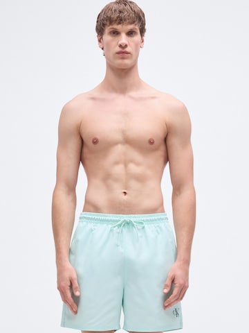 Calvin Klein Swimwear Hlače za k noši | zelena barva: sprednja stran