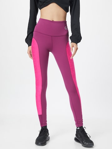 NIKE Skinny Workout Pants in Purple: front