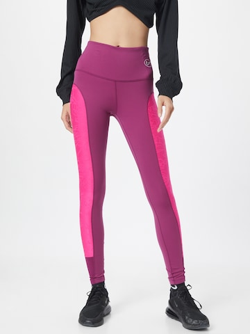 NIKE Skinny Sports trousers in Purple: front