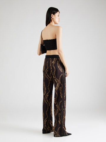 évasé Pantalon Versace Jeans Couture en noir