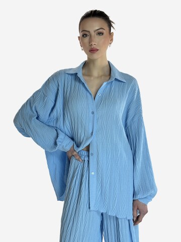 Elara Buksedragt i blå