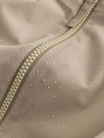 Next Tussenjas in Beige