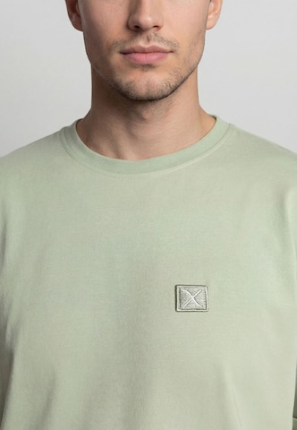 Maglietta di Clean Cut Copenhagen in verde