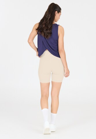Athlecia Regular Workout Pants 'Aliya' in Beige