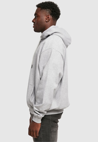 Karl Kani Zip-Up Hoodie in Grey