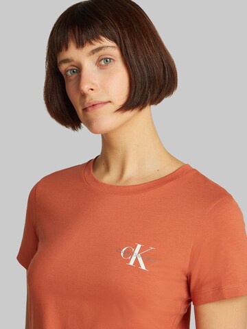 Maglietta di Calvin Klein Jeans in arancione