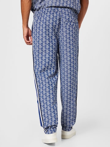 regular Pantaloni di LACOSTE in blu