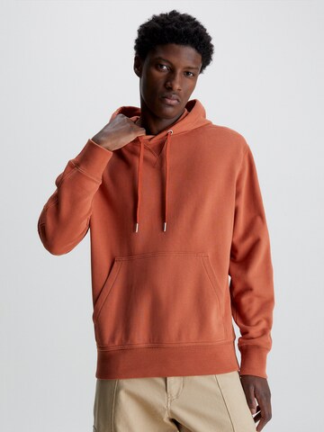 Calvin Klein Jeans Μπλούζα φούτερ σε πορτοκαλί: μπροστά