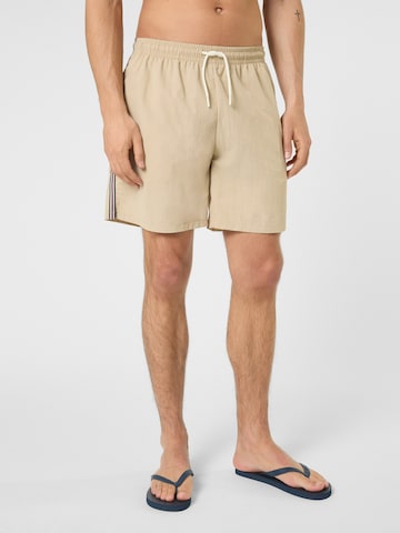 Shorts de bain 'LERICI loose heritage tape beach shorts' FILA en beige : devant