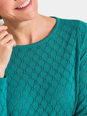 Pull-over Goldner en vert