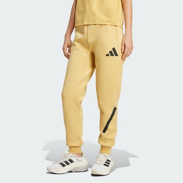 Effilé Pantalon de sport 'Z.N.E.' ADIDAS SPORTSWEAR en jaune : devant