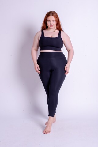 Girlfriend Collective Skinny Sporthose in Schwarz