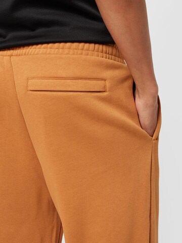 Loosefit Pantaloni di PUMA in marrone