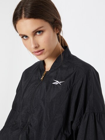 Veste de sport 'Studio Shiny' Reebok en noir