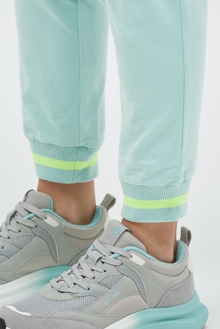 Soccx Regular Sporthose in Grün