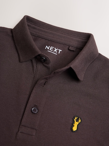 Tricou de la Next pe maro