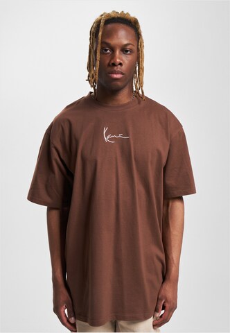 T-Shirt Karl Kani en marron : devant