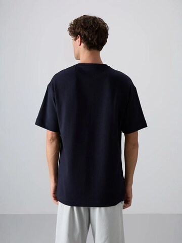 Maglietta di Tommy Life in blu