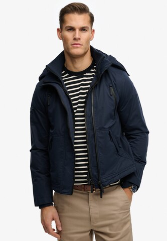 Veste mi-saison Superdry & Co en bleu : devant