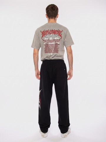 DOLLY NOIRE Luźne Spodnie 'SHARD BAGGY SWEATPANTS BLACK' w kolorze czarny