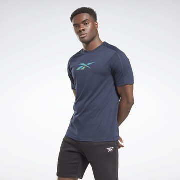 Reebok - Camisa funcionais em azul: frente