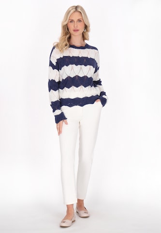 Usha Trui in Blauw
